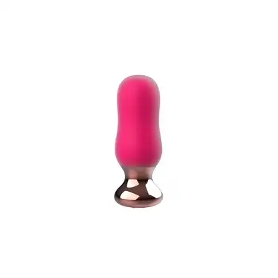 Buttocks - The Exquisite Buttplug. Wibrujący różowy korek analny z 7 trybami wibracji i 3 prędkościami, oferujący luksusową stymulację