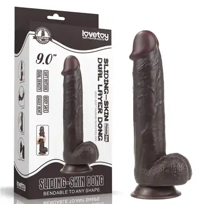 LoveToy - Sliding Skin Dual Layer Dong 9inch Brown. Realistyczne dildo z dwuwarstwowego TPE, wyposażone w technologię przesuwanej skóry i mocną przyssawkę