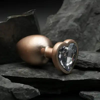 Dream Toys - Gleaming Love Pearl Gold Plug Large. Złoty elegancki korek analny o dużym rozmiarze z kryształkiem w kształcie serca