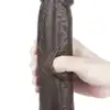 LoveToy - Sliding Skin Dual Layer Dong 9inch Brown. Realistyczne dildo z dwuwarstwowego TPE, wyposażone w technologię przesuwanej skóry i mocną przyssawkę