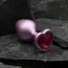 Dream Toys - Gleaming Love Pearl Pink Plug Medium. Różowy elegancki korek analny z kryształkiem w kształcie serca