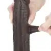 LoveToy - Sliding Skin Dual Layer Dong 9inch Brown. Realistyczne dildo z dwuwarstwowego TPE, wyposażone w technologię przesuwanej skóry i mocną przyssawkę