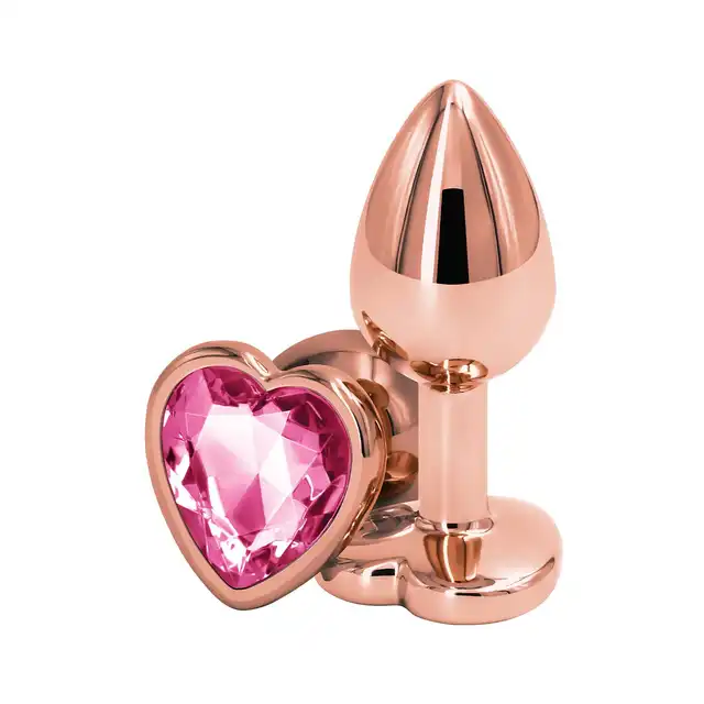 NsNovelties - Rear Assets Rose Gold Heart S Pink. Lekki i elegancki korek analny z różowym kryształkiem w podstawie