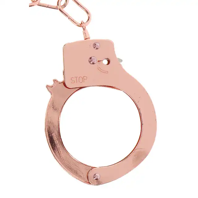 Toyjoy - Rose Gold Metal Handcuffs. Klasyczne metalowe kajdanki w kolorze różowego złota, w zestawie 2 kluczyki
