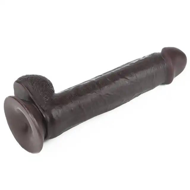 LoveToy - Sliding Skin Dual Layer Dong 9inch Brown. Realistyczne dildo z dwuwarstwowego TPE, wyposażone w technologię przesuwanej skóry i mocną przyssawkę