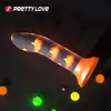 Pretty Love - Magical Nightfall. Realistyczne dildo z przyssawką i elementami świecącymi w ciemności, żółto-pomarańczowe króliczki