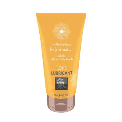 Shiatsu - Love Lubricant White tea &amp; Peach 75ml. Smakowy lubrykant o aromacie białej herbaty i brzoskwini, stworzony z myślą o intensyfikacji doznań podczas zabaw oralnych