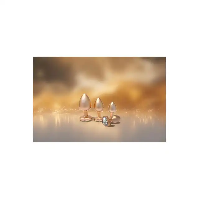 Dream Toys - Gleaming Love Pearl Gold Plug Large. Złoty elegancki korek analny o dużym rozmiarze z kryształkiem w kształcie serca