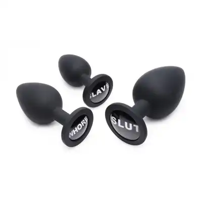 Master Series - Dirty Words Anal Plug Set. Zestaw analnych korków, 3 silikonowe wtyczki w różnych rozmiarach z erotycznym napisem w podstawie