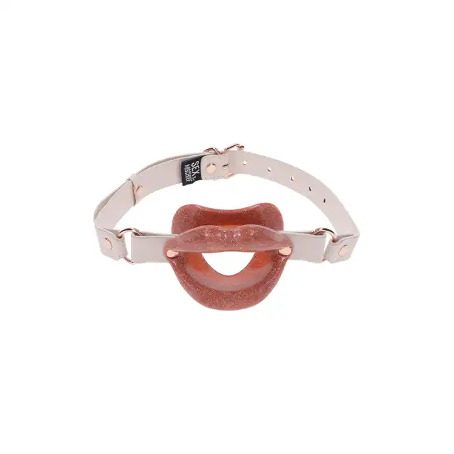 Sportsheets - Peaches'n CreMe Silicone Lips. Silikonowy knebel z brokatem w kształcie kuszących ust. Usta, które mówią wszystko
