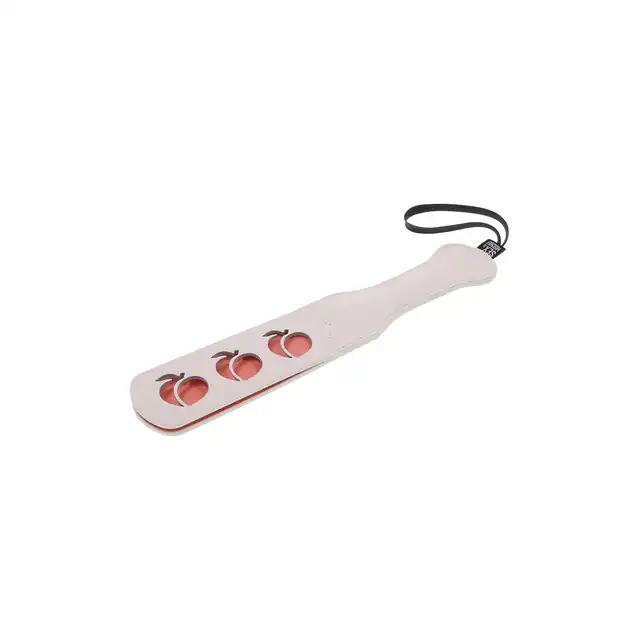 Sportsheets - Peaches `n CreaMe Paddle. Kremowa packa z wyciętą słodką brzoskwinką, uroczy gadżet BDSM