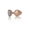 B-Series - Pearl Gold Heart Plug Clear M. Plug analny w rozmiarze M, wykonany z gładkiej stali nierdzewnej, połączenie elegancji, bezpieczeństwa i zmysłowej stymulacji.