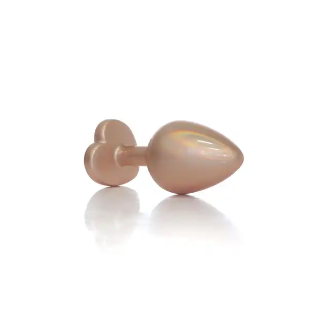 B-Series - Pearl Gold Heart Plug Clear M. Plug analny w rozmiarze M, wykonany z gładkiej stali nierdzewnej, połączenie elegancji, bezpieczeństwa i zmysłowej stymulacji.