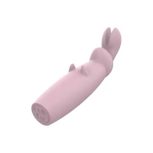 Nude - Hazel Rabbit Massager. Niewielki wibrator z króliczymi uszkami do stymulacji łechtaczki z 10 wibracjami i 3 prędkościami