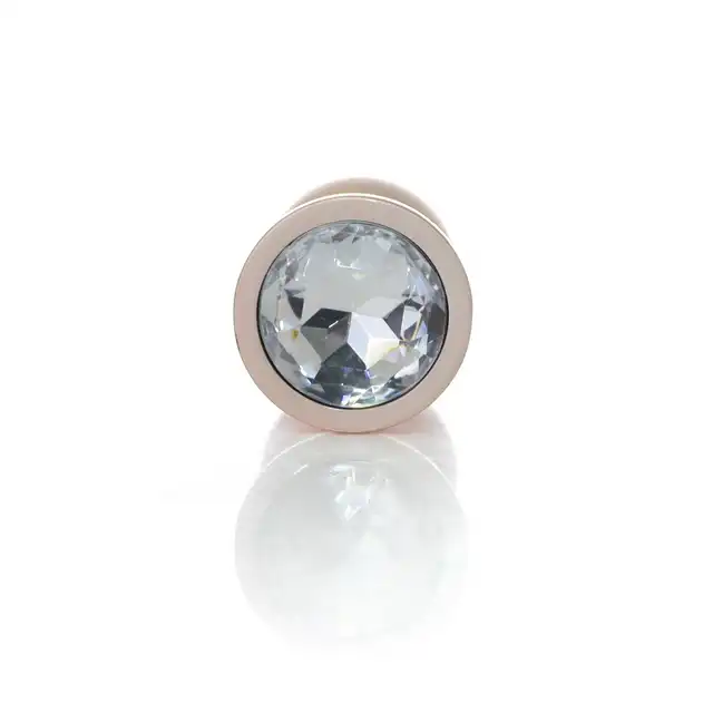 B-Series - Pearl Gold Plug Clear M. Plug analny ze stali nierdzewnej z eleganckim diamencikiem w rozmiarze M