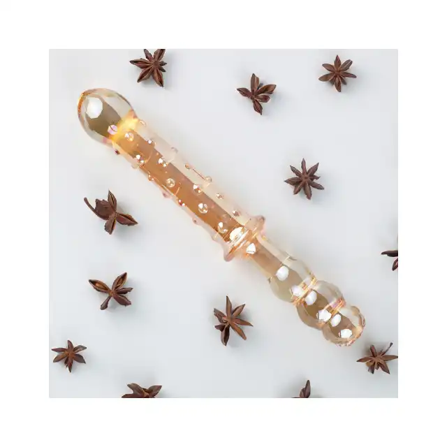 Nobü - Honey Dual Wand Orange. Podwójne dildo szklane o dwóch różnych końcówkach, zapewnia przyjemność nawet najbardziej wymagającym