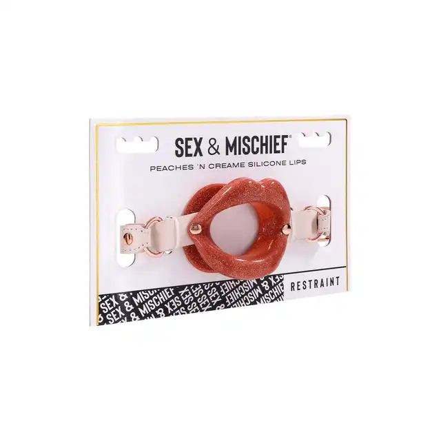 Sportsheets - Peaches'n CreMe Silicone Lips. Silikonowy knebel z brokatem w kształcie kuszących ust. Usta, które mówią wszystko
