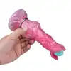 Kiotos Monstar - Cox AlienspawnCock. Unikalne, teksturowane dildo w intensywnych odcieniach różu i fioletu zapewniające kosmiczne doznania