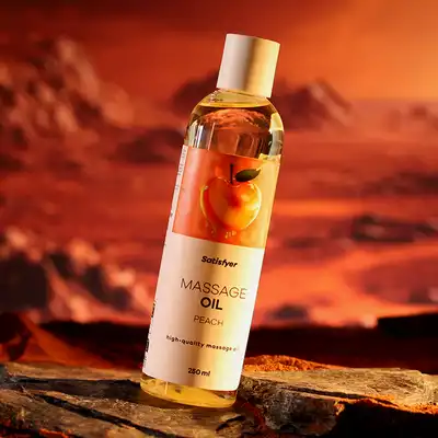 Satisfyer -  High-Quality Massage Oi Peach. Naturalny olejek do masażu o kojącym aromacie brzoskwini.