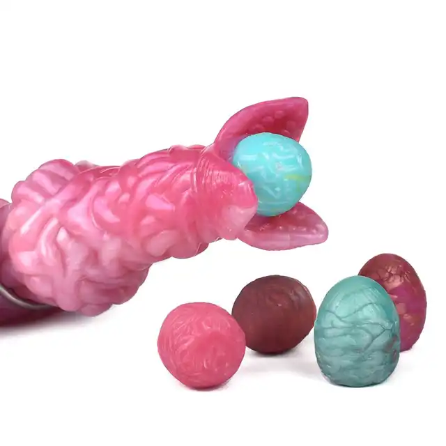 Kiotos Monstar - Cox AlienspawnCock. Unikalne, teksturowane dildo w intensywnych odcieniach różu i fioletu zapewniające kosmiczne doznania