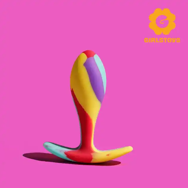 Girls Toys - Korek Eivissa. Rainbow Comfort Plug M. 9 cm. Tęczowy silikonowy plug z wygodną podstawą