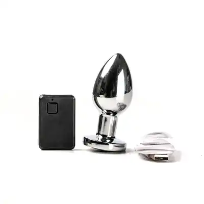 Simple Pleasure korek - Ekskluzywny wibrujący korek ze stali nierdzewnej. 10 Programów. USB. Bezprzewodowy na pilota.