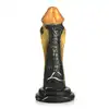 Creature Cocks – Golden Mamba Dildo. Złoto-czarna mamba w kształcie S do stymulacji G-spot i P-spot z przyssawką i kompatybilnością z uprzężą