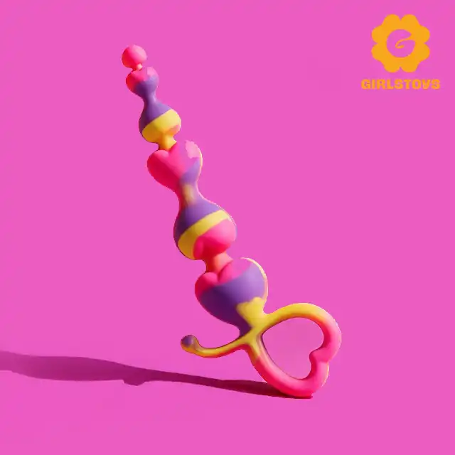 Girls Toys - Kulki analne Vias. Rainbow Heart Anal Beads. Kolorowe, tęczowe koraliki analne z uchwytem w kształcie serca