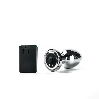 Simple Pleasure korek - Ekskluzywny wibrujący korek ze stali nierdzewnej. 10 Programów. USB. Bezprzewodowy na pilota.