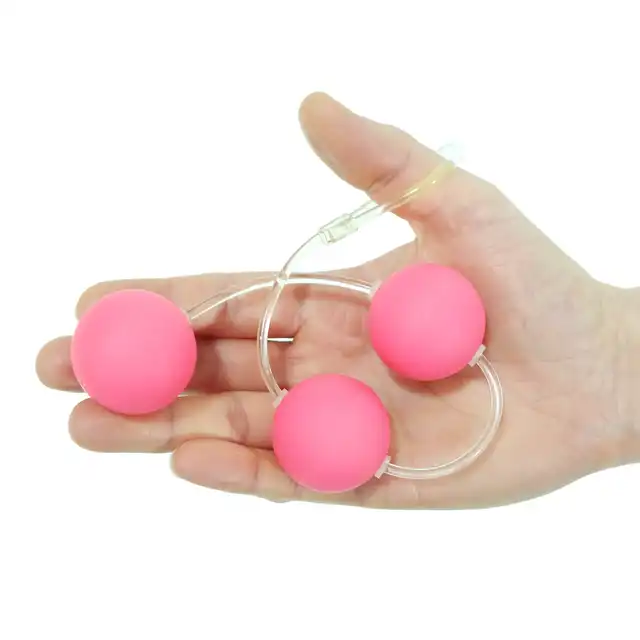 Toyz4Lovers - 3Beads Anal Beads - Eleganckie potrójne kulki analne z uchwytem. Delikatna konstrukcja i subtelny różowy kolor.