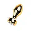 Metal by Toyfa - Gold anal plug with white round-shaped gem - Złoty korek analny w kształcie pocisku z kryształkiem.